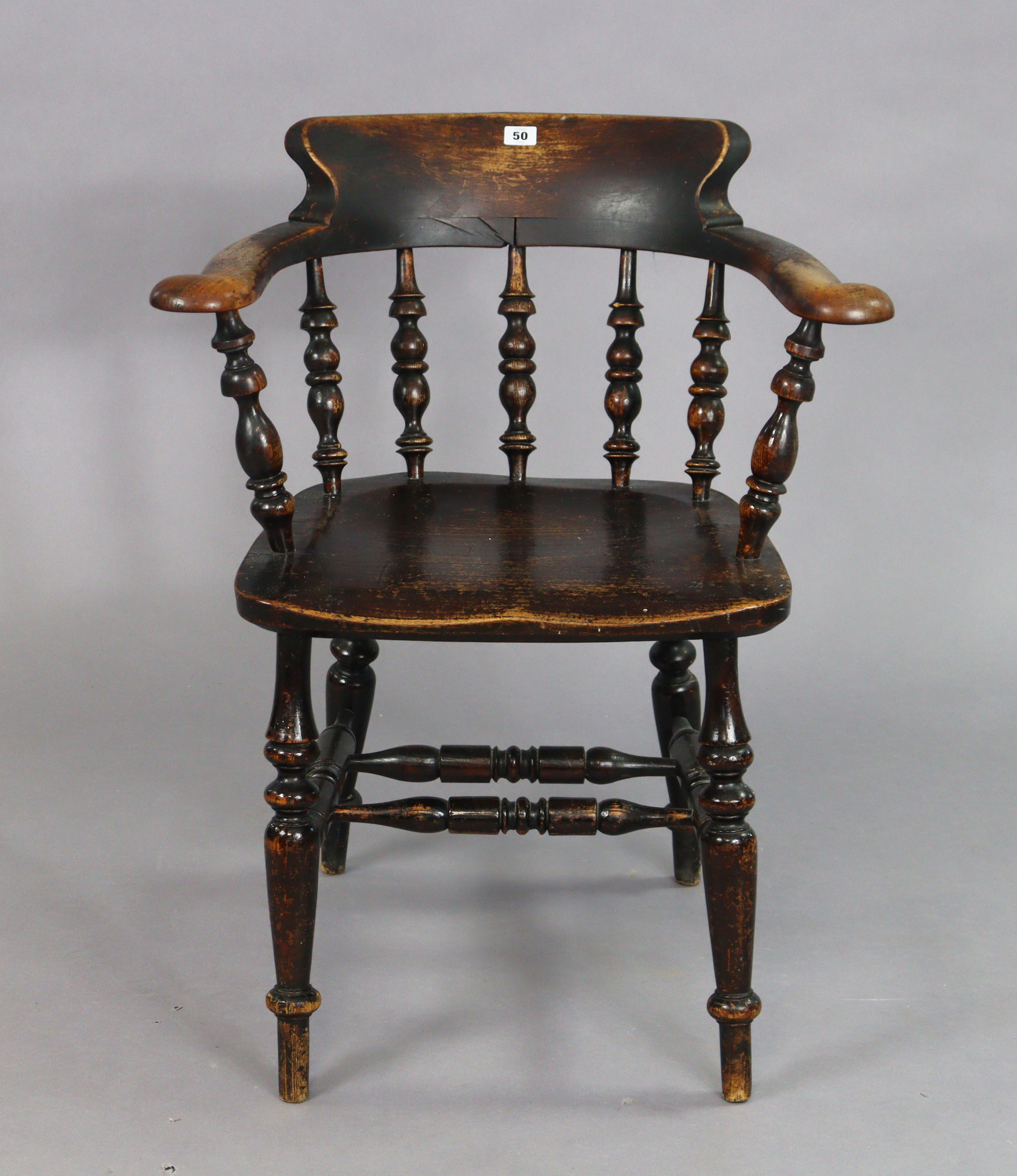 A spindle-back captain’s chair with a hard seat, & on four turned legs with spindle stretchers. - Image 2 of 5