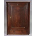 A 19th century mahogany large hanging corner cabinet with three small drawers, 91cm wide x 120.