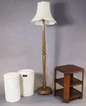 A gold painted wooden standard lamp with shade; together with an oak square three-tier book table; &