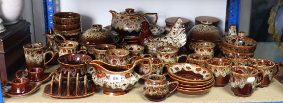 Forty-four items of Foster’s pottery “Honeycomb” dinner, tea, & coffee ware.