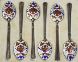 A set of six silver-gilt & enamel coffee spoons with fluted stems, the bowl-backs with floral