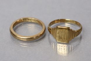 A 9ct. gold wedding band, size: L; & a 9ct. gold signet ring, size: P (shank broken); 5.2cm total.