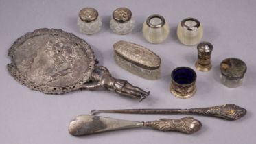 A pair of small spherical ribbed glass match-striker pots with silver mounts; four glass dressing