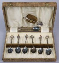 A set of eight Scottish silver teaspoons, the thistle stem with coloured hardstone finials, (three