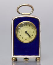 An early 20th century miniature gilt-brass & enamel travelling timepiece with deep blue guilloche