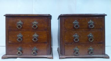 A pair of late Victorian mahogany chests, each with three drawers, on a plinth  12"h 10"w