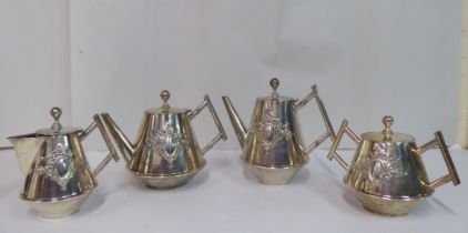 A Continental white metal four piece tea set