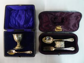 Two boxed silver Christening sets  mixed marks