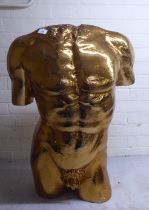 A gold painted plaster sculpture, a nude male torso  29"h