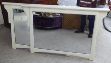 A pair of modern shabby chic painted wooden overmantel mirrors  32" x 46"