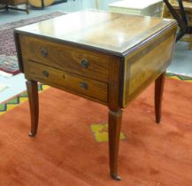 An Edwardian crossbanded walnut, ebony inlaid, satin mahogany sofa table with opposing drawers and