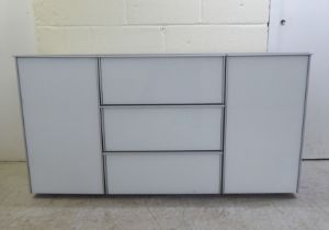 A modern white and grey laminate and satin silver coloured metal mounted sideboard, comprising a