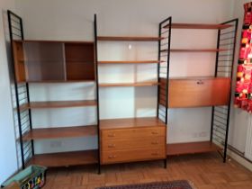 A Staples Ladderax modular triple section livingroom unit, comprising an arrangement of cabinets and