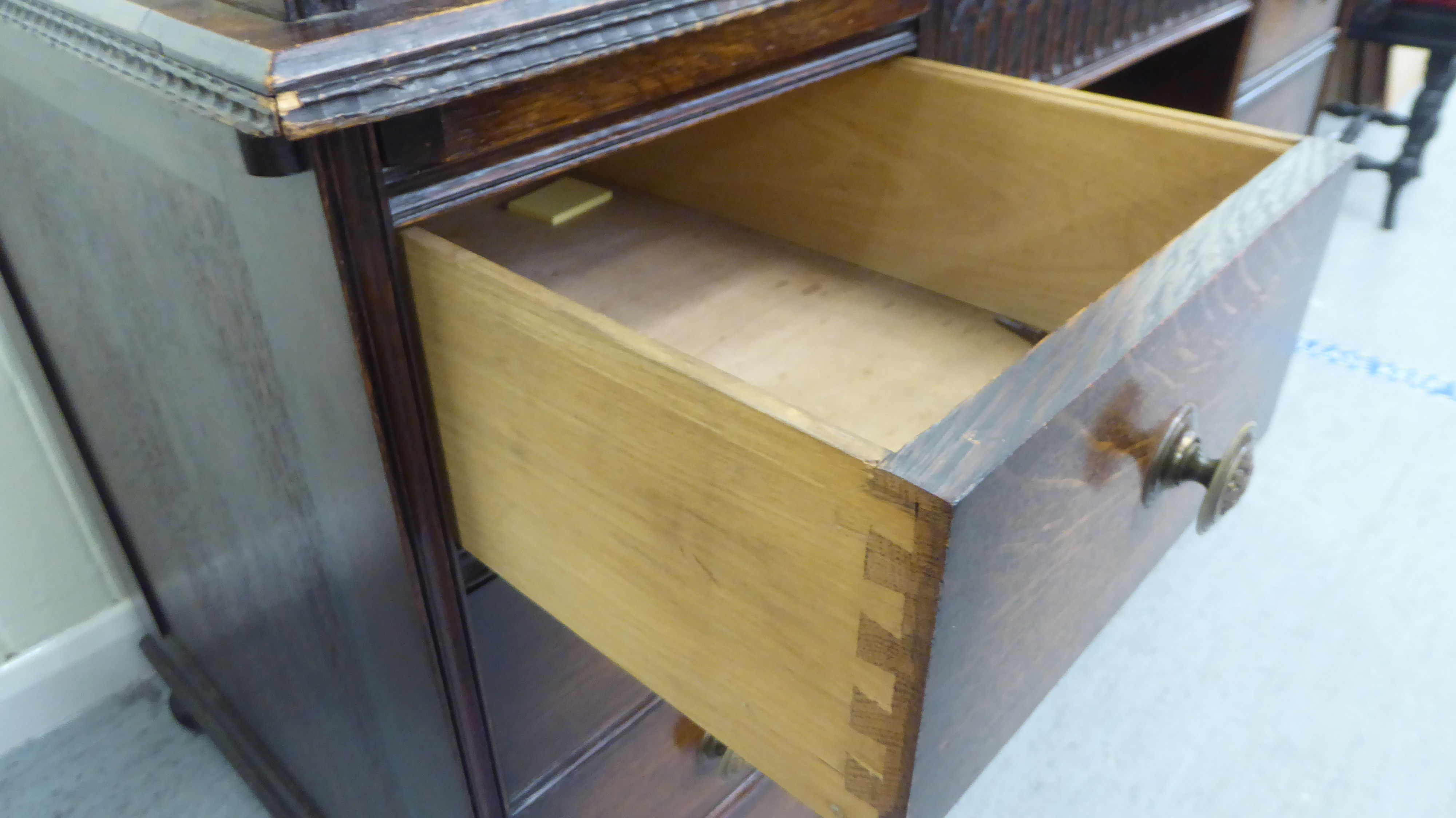 A 1930s oak roll top desk with twin pedestals, comprising an arrangement of eight drawers, raised on - Image 4 of 4