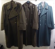 Ten various military and related greatcoats: to include British, US and German (Please Note: this