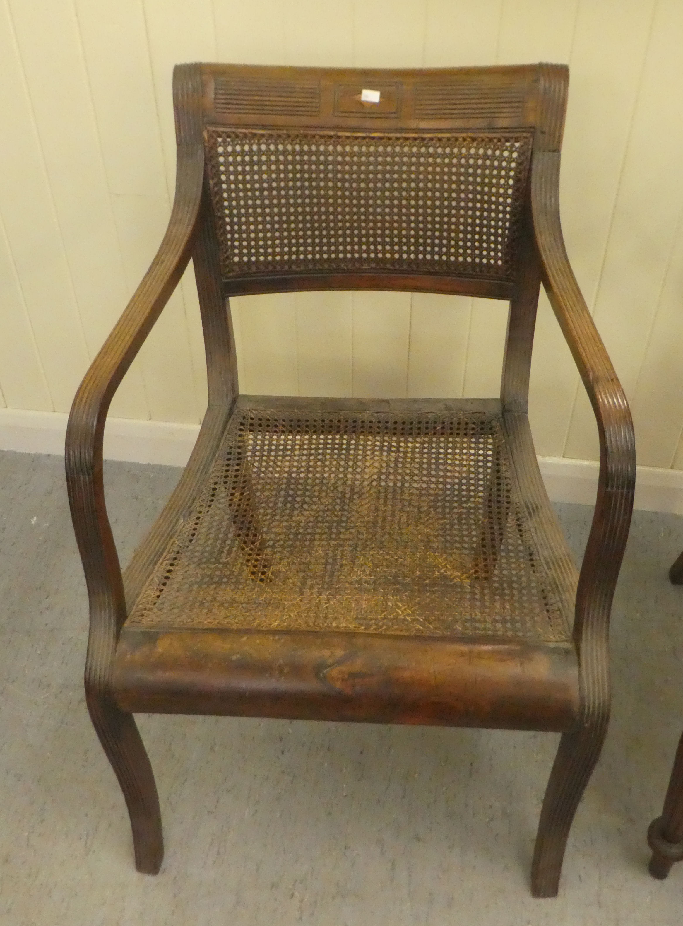 A Regency mahogany framed dining chair with a bar back and swept open arms, raised on turned, reeded - Image 3 of 4