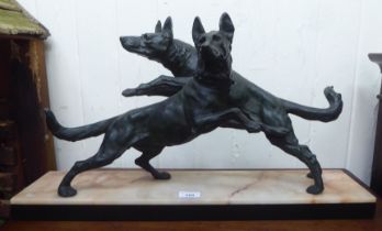 A 1930s Art Deco patinated bronze ornament, two playful dogs, on a marble plinth  14"h