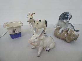 Mixed ceramics, viz. a Beswick goat and pig; a pair of Nao playing puppies; and a Wedgwood