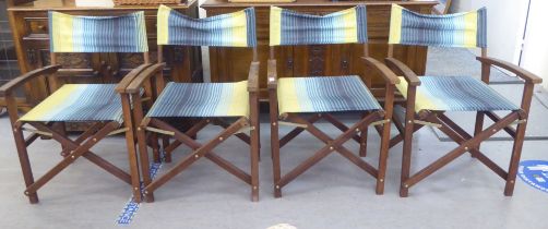 A set of four John Lewis teak framed, folding directors chairs with fabric backs and seats