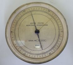 A United States Maritime Commission brass cased bulk head barometer  Serial No.42-2439  6"dia