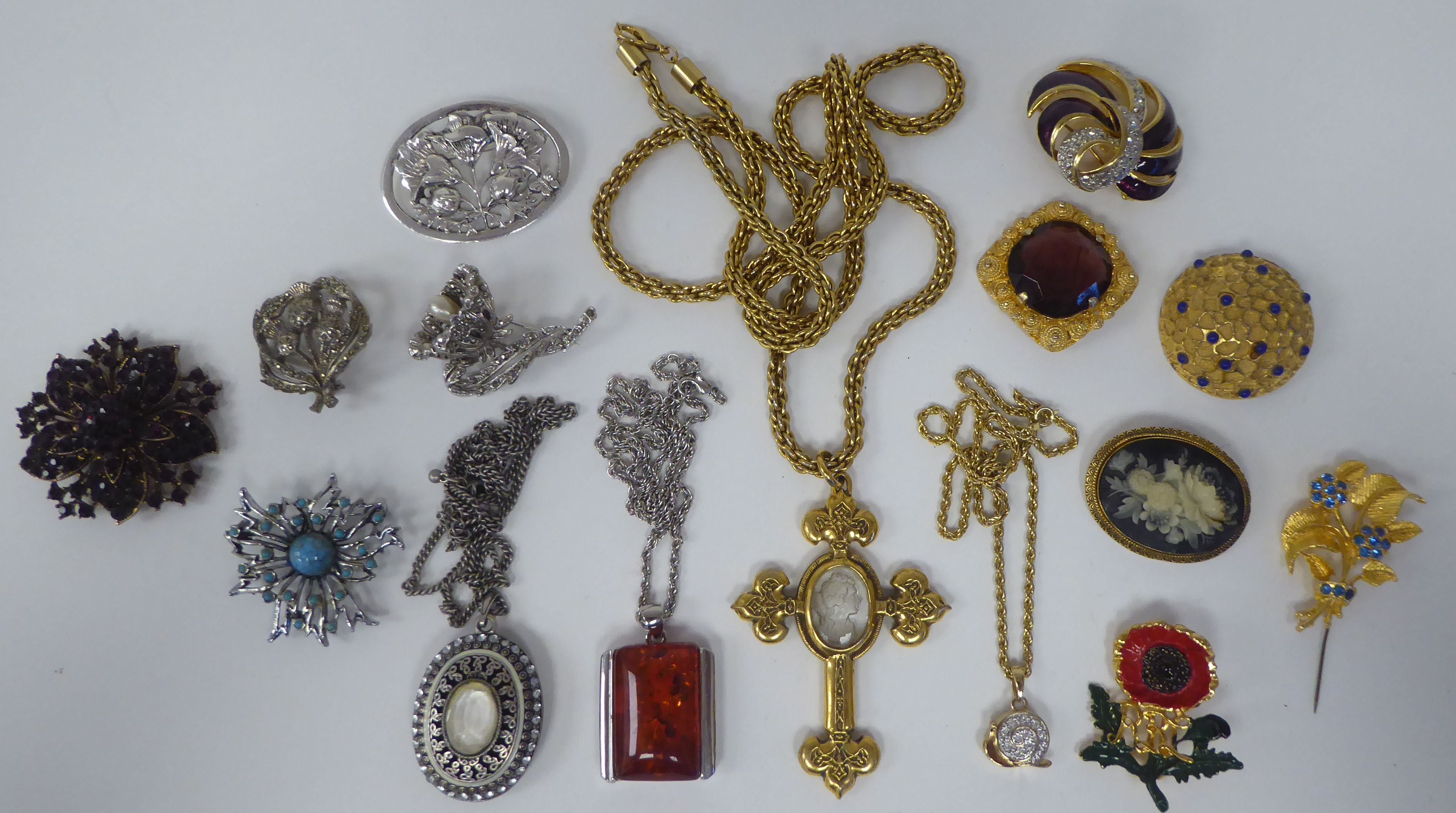 Costume jewellery, mainly brooches and pendants of various design