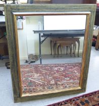 A modern mirror, in a swept gilt frame  38" x 32"