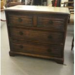 A modern 18thC design oak dressing chest with three long drawers, decorated with linenfold ornament,