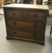 A modern 18thC design oak dressing chest with three long drawers, decorated with linenfold ornament,