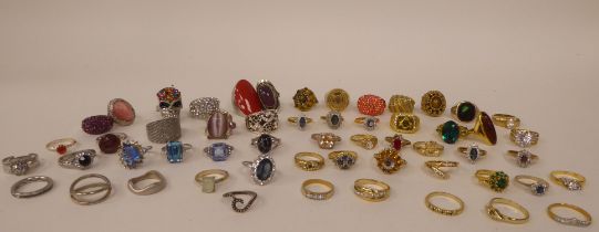 Signet style and other dress rings in white and yellow metal, variously set with coloured stones