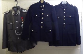 Approx. twenty various mainly British military uniforms: to include tunics, jackets and coats (