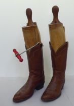 A pair of Tony Lama brown leather cowboy boots  size 9
