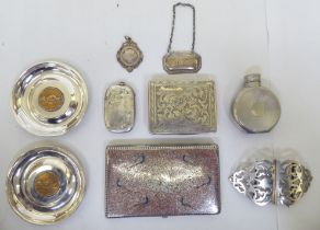 Silver and EPNS collectables: to include a hip flask; and a profusely decorated cigarette case