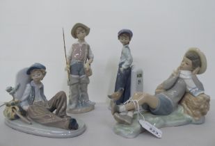 Four Lladro figures: to include a young boy holding a fishing rod  9"h