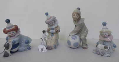 Four Lladro figures, clowns, one playing an accordion for a puppy  6"h