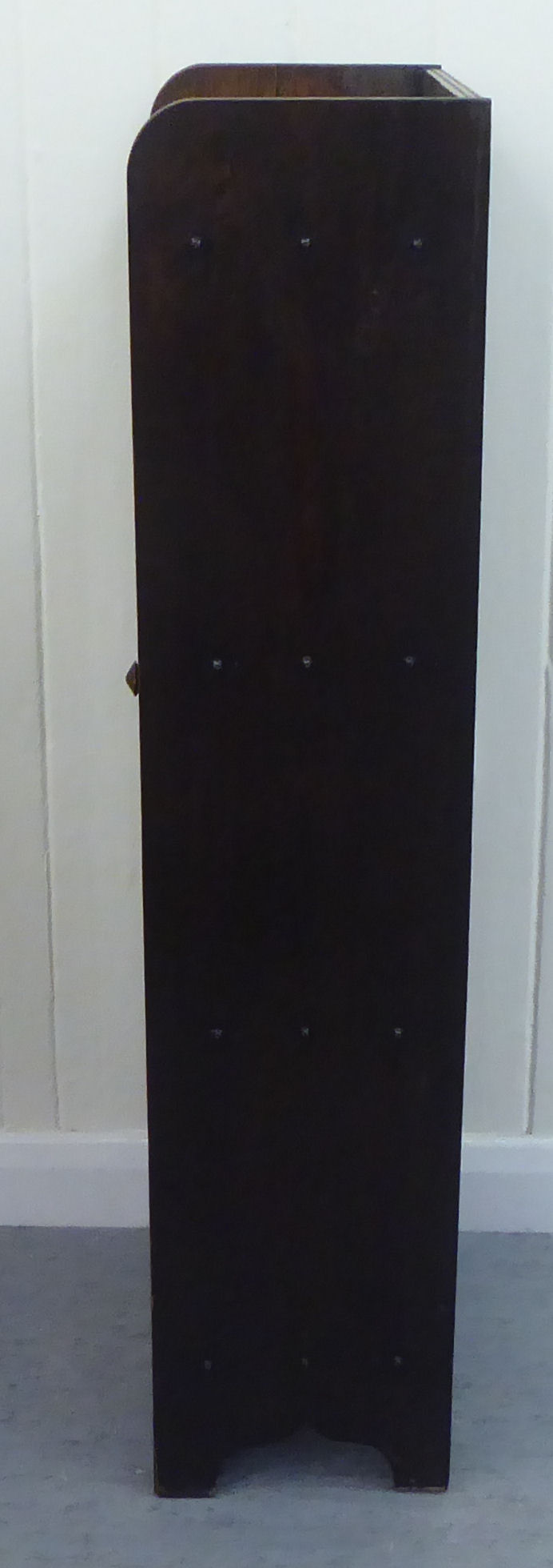 A 1920s oak bookcase, the lead framed and glazed door revealing three shelves, raised on bracket - Image 4 of 4