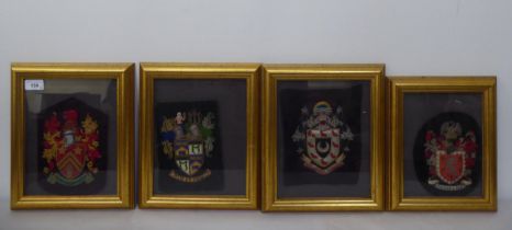 Four embroidered crests  8"h  framed