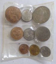 An uncollated collection of British and foreign coins, plaques and medallions, in a table-top