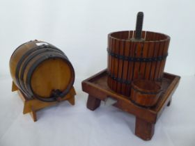 A scratch built wine making press; and a barrel design dispenser