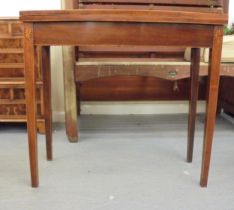 An early 19thC mahogany bow front card table with a foldover top, raised on square legs  29"h  32"w