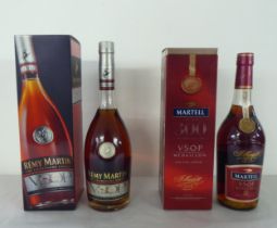 Two bottles of Remey Martin Cognac