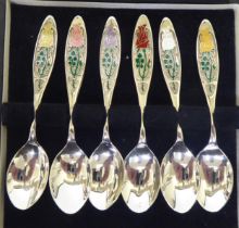 A set of six silver 'Year of the Roses' themed teaspoons  Birmingham 1976  boxed