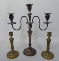 A silver plated three branch candelabra, decorated with beading  17.5"h; and a pair of brass