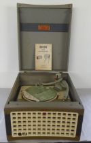 A vintage Decca SG177 table-top stereogram with a Monnach autochanger, in a two tone vinyl case