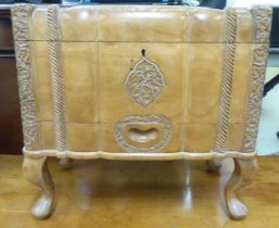 A Kashmiri carved teak sewing box with a tray fitted interior  15"h  17"w