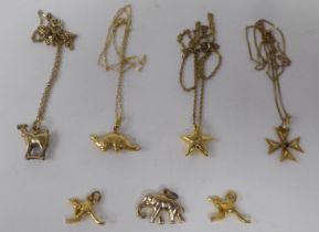 Yellow metal items of personal ornament: to include  pendants, on fine neckchains