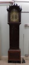 A late 18thC mahogany longcase clock, the arched fretworked hood and glazed window, between reeded