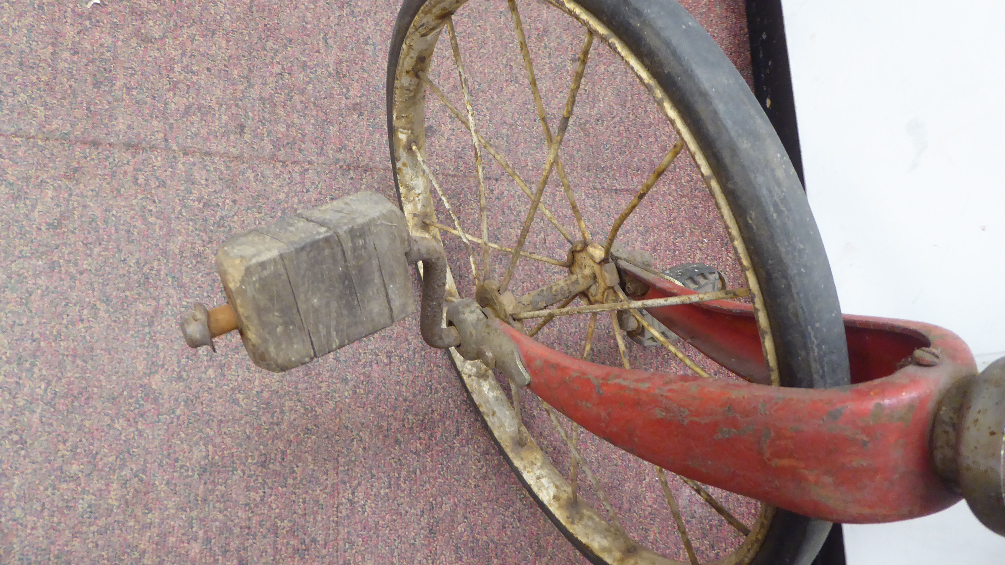 A child's vintage Tri-ang bicycle with a red painted frame and downswept handlebars, the pedals - Image 5 of 7