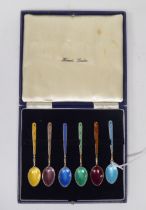 A set of six silver gilt and multi-coloured enamel coffee spoons  Birmingham marks rubbed