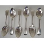 A matched set of six Victorian silver fiddle pattern dessert spoons  mixed marks  (combined weight