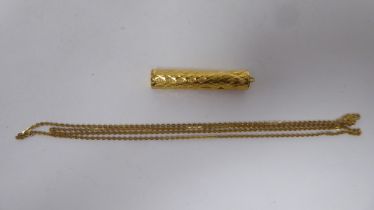 A Judaica 22ct gold scroll pendant  stamped 916; and a 22ct gold fine neckchain